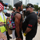 Black Lives Matter Organizer in Florida Facing Felony Charges for Snatching Flags at Pro-Trump Event